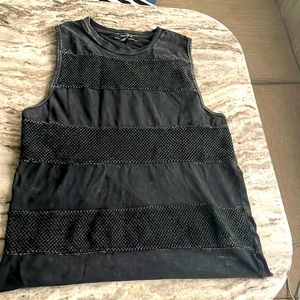 Charcoal black fishnet vintage tank top with mesh material and tight fit.